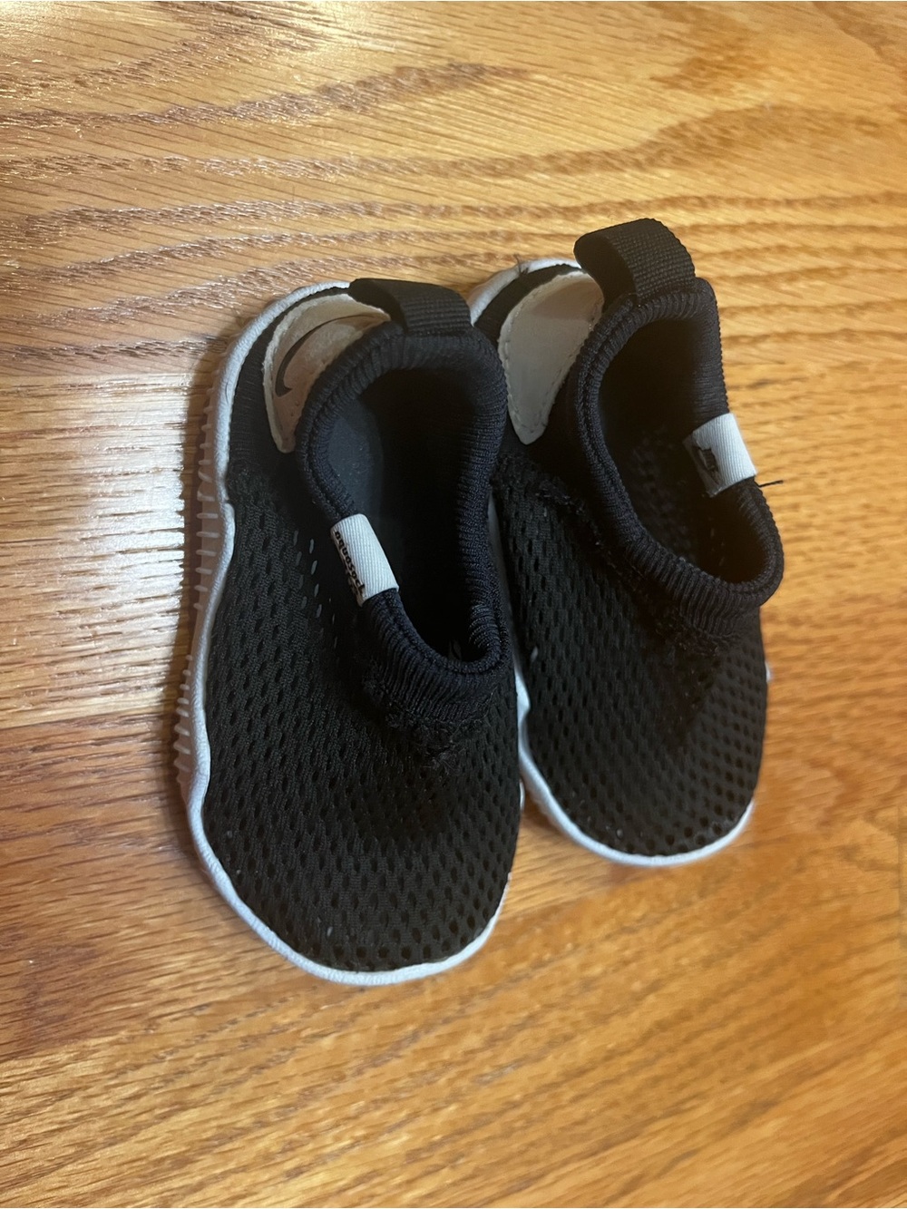 Nike Kids Black and White Slip-On Mesh Sneakers